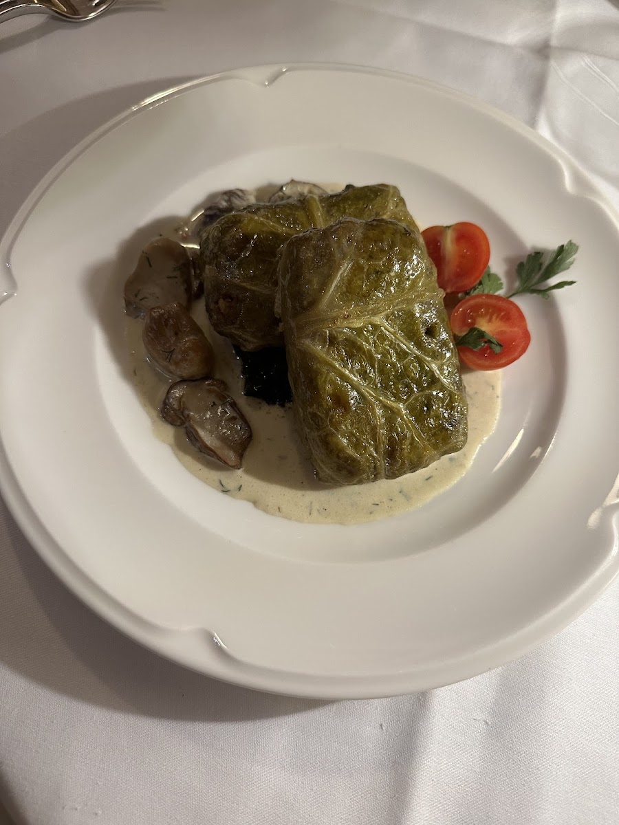 Stuffed cabbage with mushroom sauce