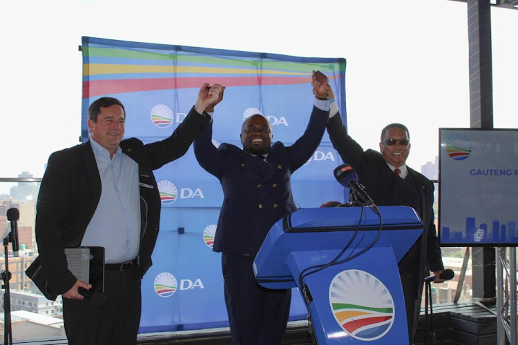 DA leader John Steenhuisen, left, Gauteng leader Solly Msimanga and DA federal chairperson Ivan Meyer at the party's announcement of its Gauteng premier candidate.