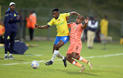 Teboho Mokoena of Mamelodi Sundowns and Iqraam Rayners of SuperSport United during the MTN8 quarterfinal match at Tuks Stadium in Pretoria on August 28 2022.