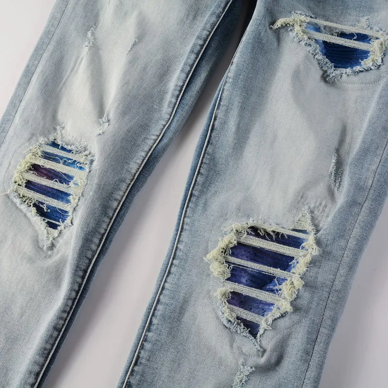 Pantalones ajustados de lápiz skinny con agujeros elásticos – perfectos para una figura estilizada y un look moderno y cómodo.