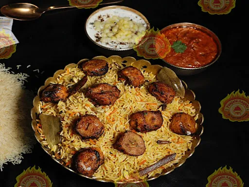 Chaap Tikka Dum Biryani With Raita Or Gravy (Serves 1-2)