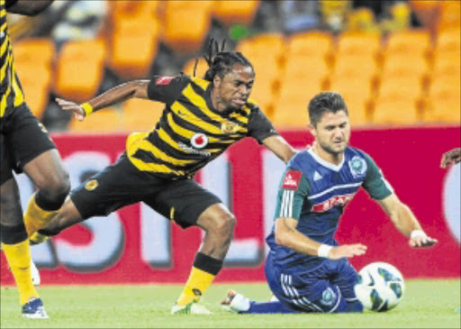 HANDS ON: Marc van Heerden of AmaZulu is fouled by Siphiwe Tshabalala of Kaizer Chiefs during their Absa Premiership match at FNB Stadium last night. Chiefs won the game 2-0. Photo: BackpagePix