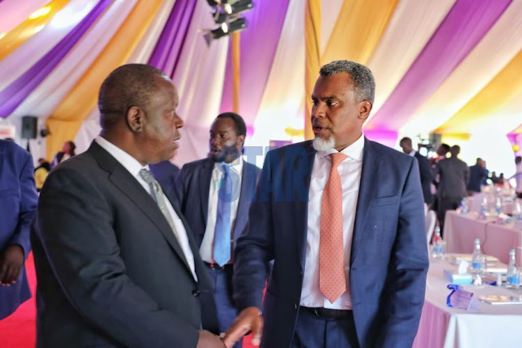 Interior CS Fred Matiang'i interacts with DPP Noording Haji during the annual National Conference on criminal justice reforms conference in Naivasha on Tuesday, May 10, 2022.