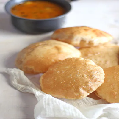 Atta Poori (5 Pcs) + Chana Masala