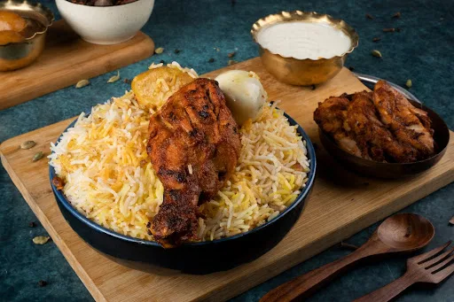 Tangri Kebab Biryani With Egg Raita And Fry Chicken