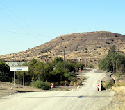 The mostly dry river, the Van der Bylskraal, separates the eastern and western sides of the sleepy village of Merweville, Western Cape.