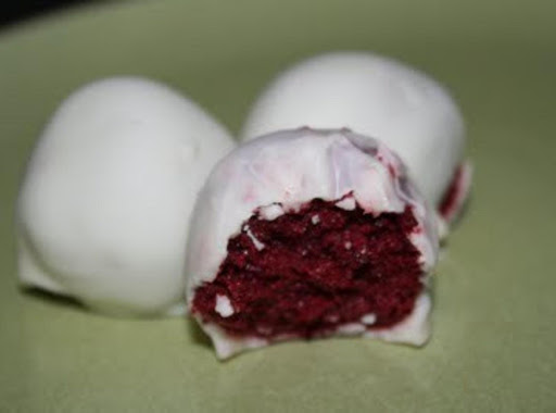 Red Velvet cake balls dipped in white chocolate.