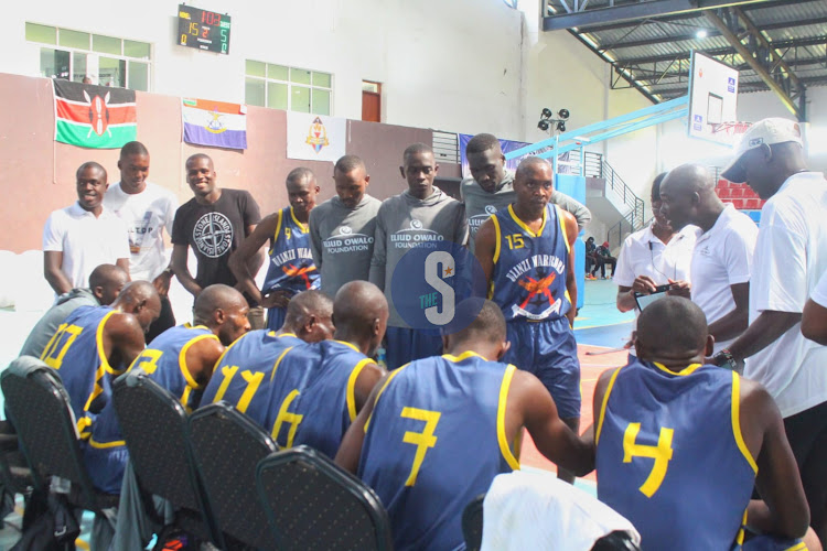 Ulinzi Warriors receive instructions from their tactician Benard Mufutu during their semi final match at Ulinzi Sports Complex on May 12, 2024.