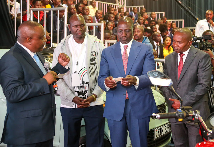 President William Ruto with Interior and National Admnistration CS Kithure Kindiki during the launch of digitised government services on June 30, 2023.