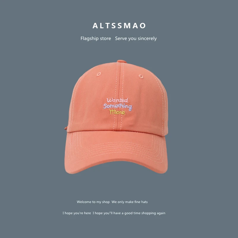 Casquette de baseball avec visière solaire et petites lettres affichant un visage. Protection solaire et style décontracté quotidien.