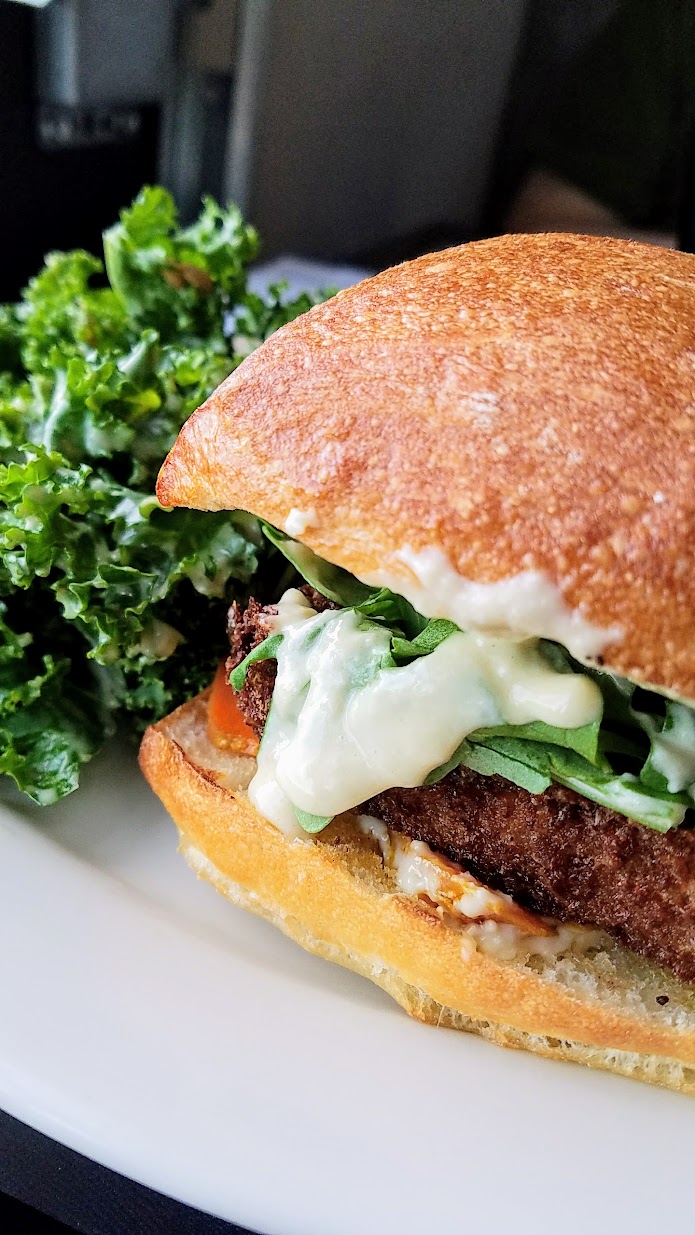 Ecliptic Brewery's vegetarian/vegan option to their burgers - this Farro Burger with a wheat-garlic patty, tahini, arugula, spicy pickled carrots