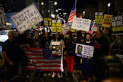 Protestors led by the families of hostages during a demonstration calling on US President Joe Biden and the US administration to secure a hostage deal ahead of Ramadan outside the US Embassy Branch in Tel Aviv on March 5, 2024 in Tel Aviv, Israel. Over the weekend, the vice president of the United States voiced that country's most forceful demand yet that there be an immediate ceasefire in the conflict, imploring Hamas to agree to the a six-week pause in fighting and calling on Israel to increase the flow of aid into the territory.  