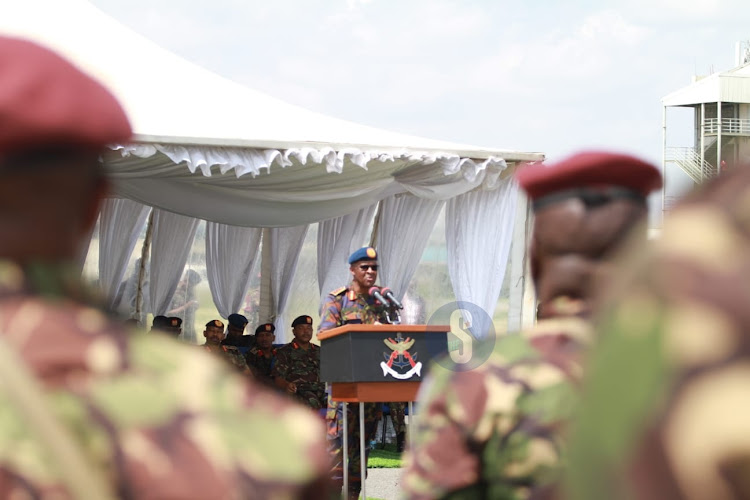 Chief of Defence Forces Francis Ogolla addresses KDF troop from the Democratic Republic of Congo after they arrived at the Embakasi Garrison in Nairobi on December 21, 2023.