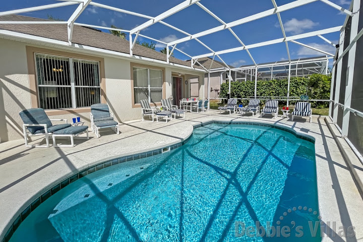 Sun-drenched pool deck at this Highlands Reserve vacation villa