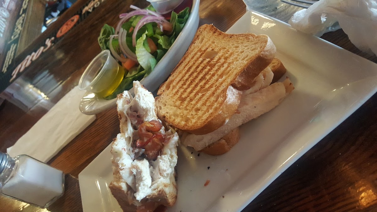 Gluten free pollo pancetta panini with a side salad.