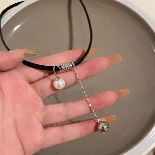 Title 3, Womens Pearl Tassel Leather Necklace, a stylis...