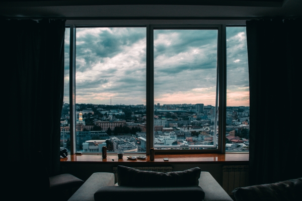 view-city-from-large-window-high-house