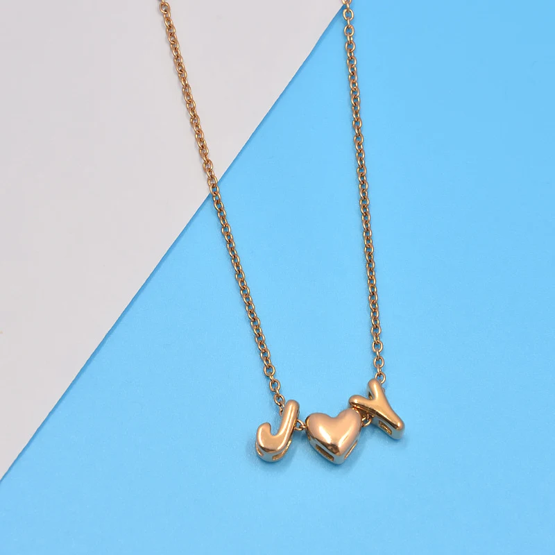 Collier 26 lettres bulles cœur amour. Cadeau personnalisé et significatif. Exprimez vos sentiments avec ce bijou unique, idéal pour noms ou initiales.