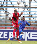 Phineas Ravhuhali of Tshakhuma Tsha Madzivhandila challenged by Gamphani Lungu of Supersport United during the DStv Premiership 2020/21 match between Tshakhuma Tsha Madzivhandila and Supersport United at Thohoyandou Stadium, Venda, on 24 January 2021.