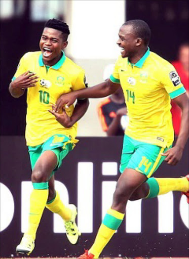 Menzi Masuku and Gift Motupa of South Africa celebrating. File Photo Image: Picasa Backpagepix