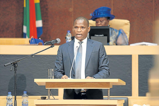 UNPACKING PLANS: MEC for finance Sakhumzi Somyo delivers his budget speech at the legislature in Bhisho Picture: MARK ANDREWS