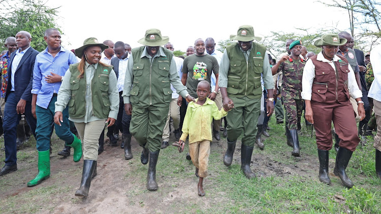 President William Ruto, Deputy President Rigathi Gachagua and First Lady Rachel Ruto lead other government officials for a tree planting exercise at Kiu Wetland in Makueni County on Monday, November 13, 2023.