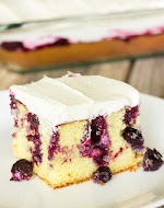 Blueberry Lemon Poke Cake Recipe was pinched from <a href="http://www.thewholesomedish.com/blueberry-lemon-poke-cake/" target="_blank">www.thewholesomedish.com.</a>