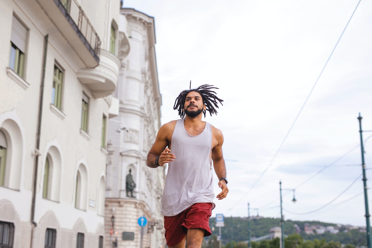 man running on the road, jogging, cardio, fitness, get in shape, new year, resolutions