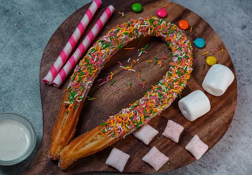 White Chocolate With Rainbow Sprinkles Churros Mega Loops