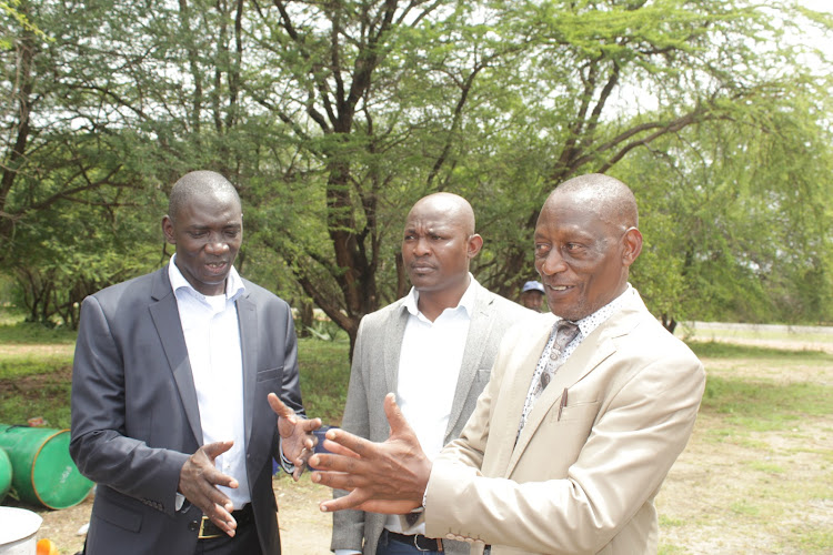 Government spokesperson Cyrus Oguna and Machakos leaders at Masinga airstrip on Thursday.