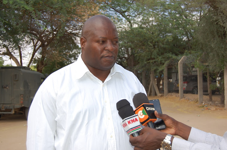 County civil registration officer Patrick Ingutia addressing the press in Garissa on Wednesday.