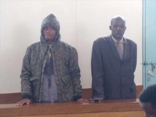 Evans Kasyoki (L) at the High Court in Machakos, August 15, 2018. /GEORGE OWITI