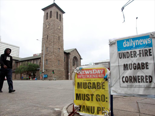 Newspaper billboards are seen in Harare, Zimbabwe November 18, 2017. /REUTERS