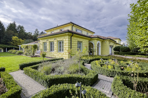 Yellow villa with landscaped garden in this luxury villa for sale in Osnice (1,088 m²)