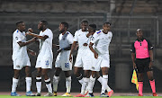 Thatayaone Ditlhokwe of SuperSport United celebrates his goal with teammates during the DStv Premiership match against Maritzburg United at Lucas Moripe Stadium  in Pretoria on September 25 2021.