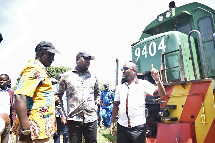 Roads and Transport CS Kipchumba Murkomen, Uganda's State Minister for Works and Transport Musa Ecweru and Kenya Railways Manager in charge of Train Operations Erick Njoroge in Malaba on May 27, 2023.