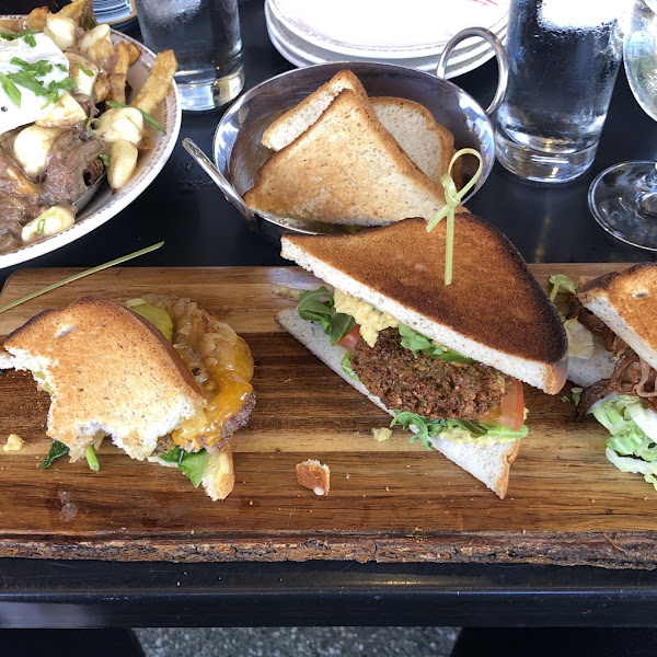 GF Sliders! Best cheeseburger I’ve had in a long time.  Falafel was SO good. And then the BBQ slider had the most amazing Brussel sprout slaw and even had fries onions on it.  😋