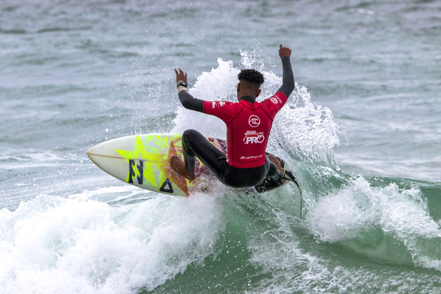 Angelo Faulkner from Jeffreys Bay reveled in the onshore conditions and high tide bowls, finding some fun sets among the onshore white-caps at Pollok Beach.