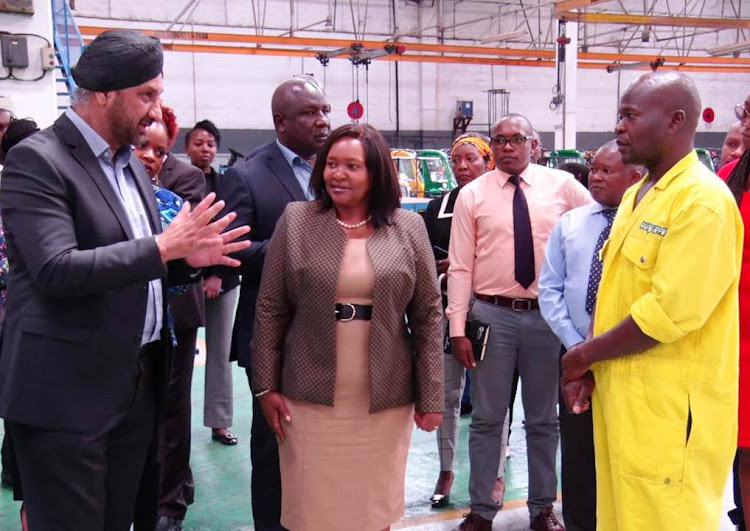 Trade and Industrialization CS Rebecca Miano (C) tours Thika’s Kenya Vehicle Manufacturers (KVM) plant to witness assembly of electric buses, on April 16, 2024