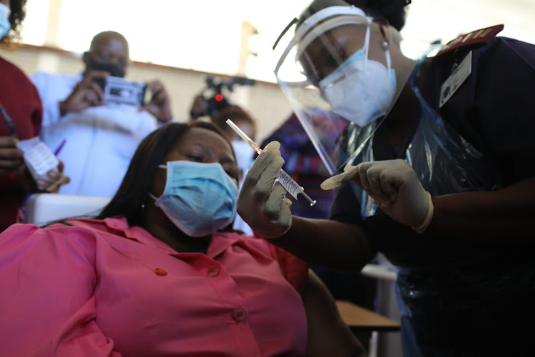 Gauteng health MEC Dr Nomathemba Mokgethi gets her potentially life-saving shot.