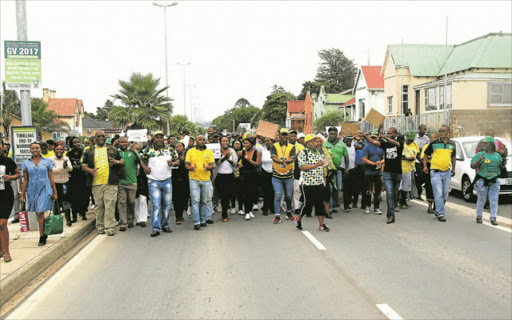 CALATA CLASH: A group of disgruntled ANC members and supporters protest outside the party’s provincial headquarters, Calata House in King William’s Town, yesterday Picture: ZOLILE MENZELWA