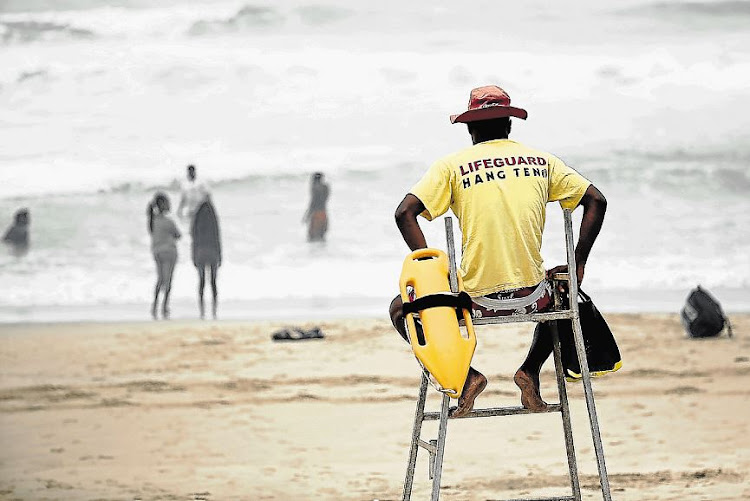 A lifeguard keeps an eye on beachgoers at Eastern Beach.