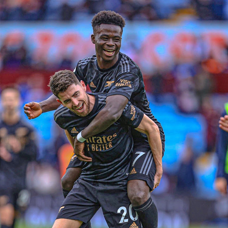 Arsenal's Bukayo Saka celebrates with Jorginho during a recent match