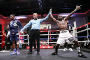 Sabelo Ngebinyana celebrates his win over Old Bones Magwaca. 