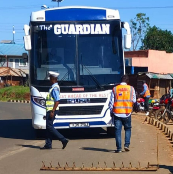 NTSA offcers and Traffic police conduct safety checks on a vehicle along Kisii-Migori road on May 12, 2024.