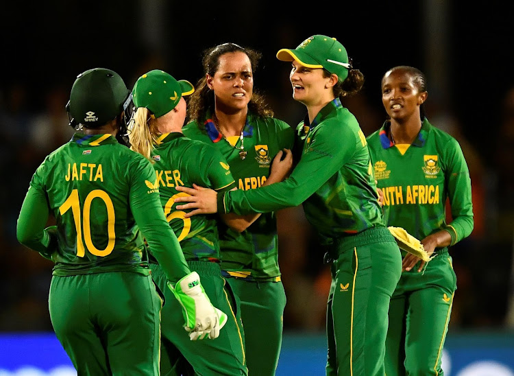 South Africa's Chloe Tryon celebrate taking the wicket of Sophie Devine of New Zealand during the ICC Women's T20 World Cup match at Boland Park on February 13, 2023.