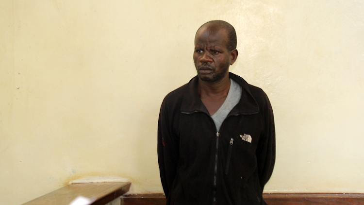 Peter Karanja, a suspect in the injuring of Juja OCS John Misoi, at Thika law courts on Tuesday.