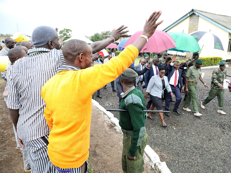 Interior Cabinet Secretary Kithure Kindiki waving at prisoners at the Naivasha Maximum Prison in Nakuru County on February 28,2024