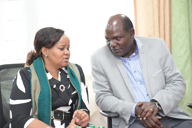 IEBC Chairman Wafula Chebukati with vice-chairperson juliana Cherera