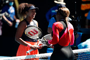 Serena Williams of the United States (R) embraces Naomi Osaka of Japan following her defeat in their Women’s Singles Semifinals match during day 11 of the 2021 Australian Open at Melbourne Park on February 18, 2021 in Melbourne, Australia. 